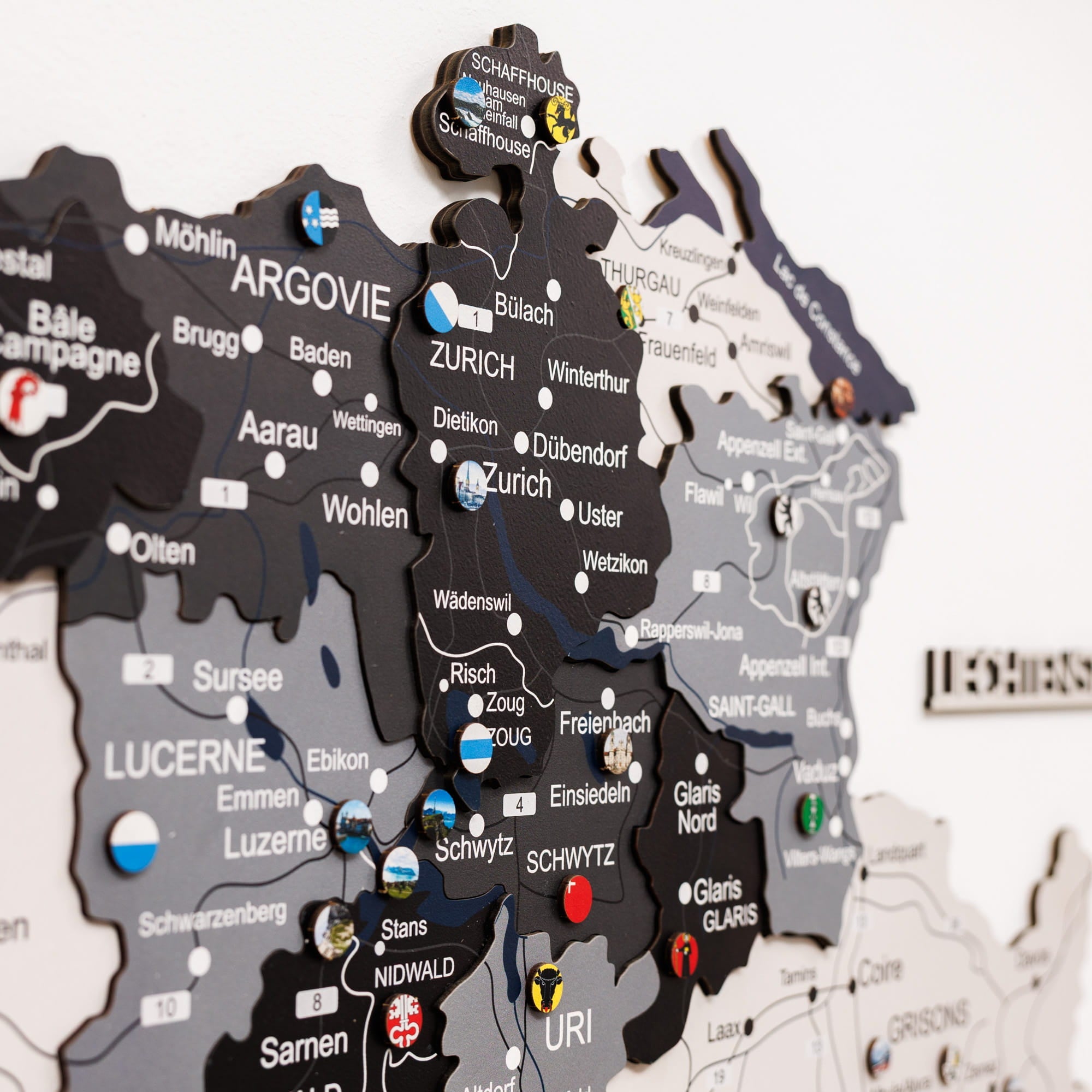 Map of Switzerland with regions labeled and pins indicating locations.