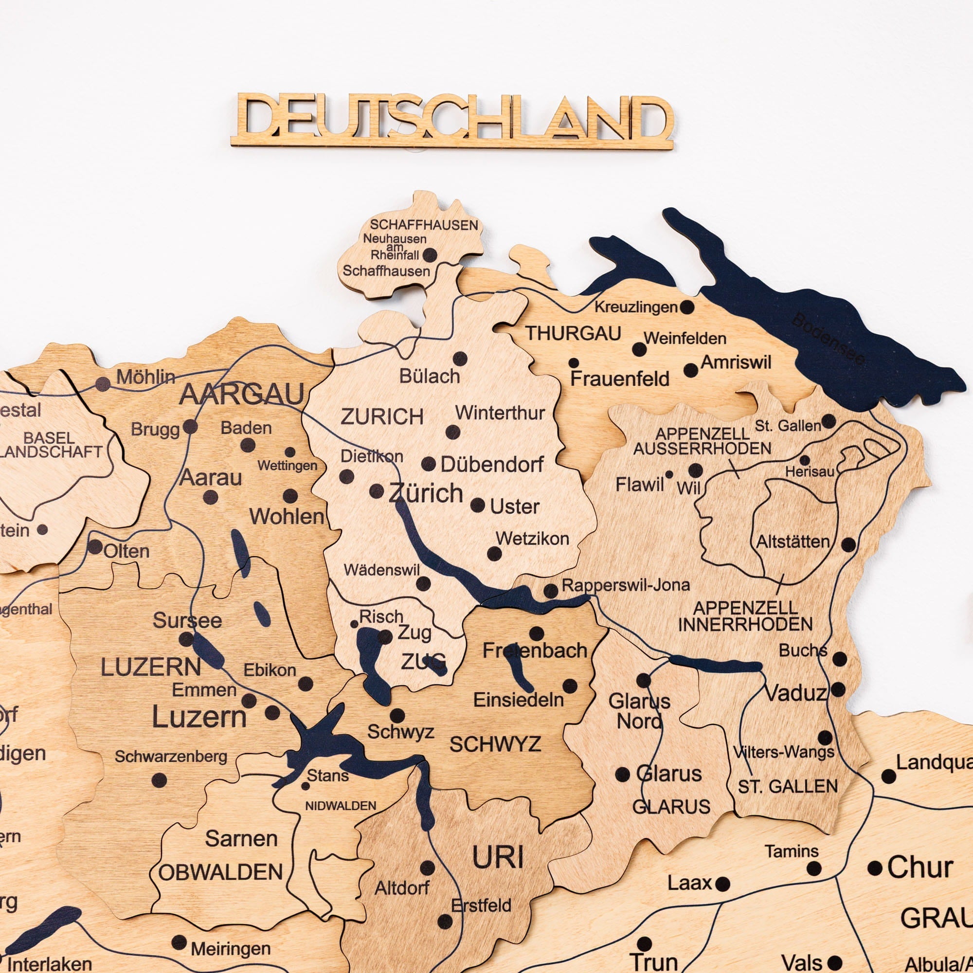 Wooden map of Switzerland with German text