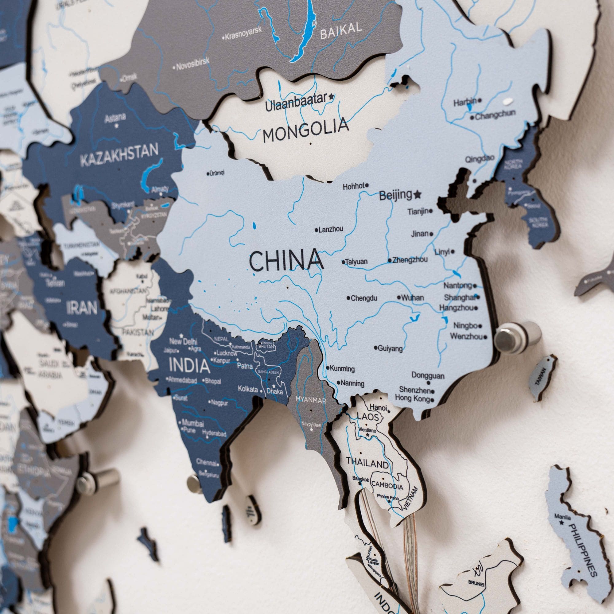 Wooden puzzle map of Asia with countries labeled