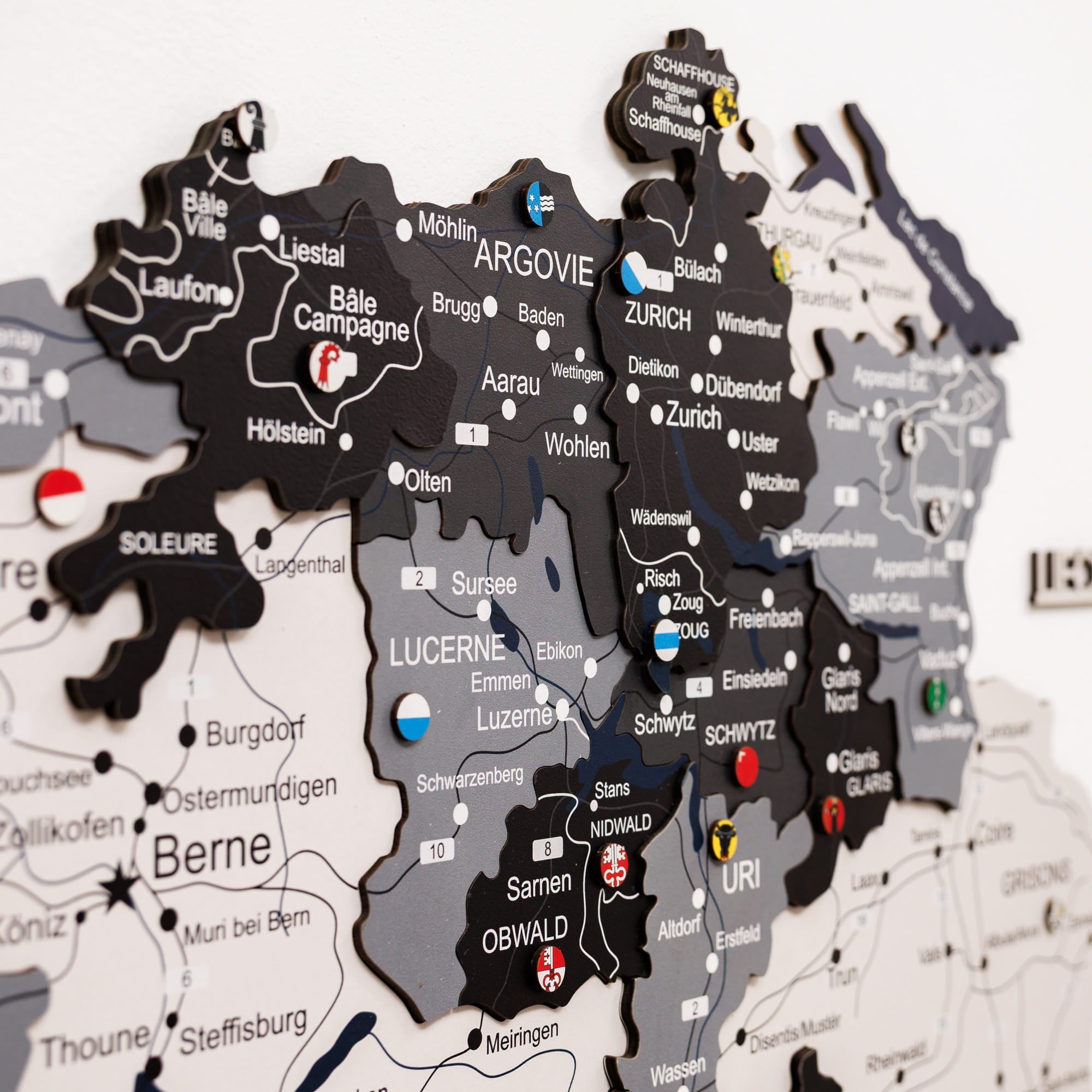 Map of Switzerland with cantonal flags on a white background