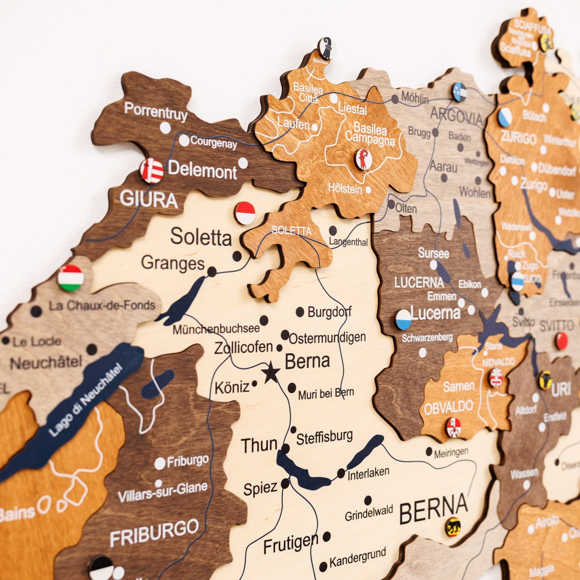 Wooden puzzle map of Switzerland with cantonal flags