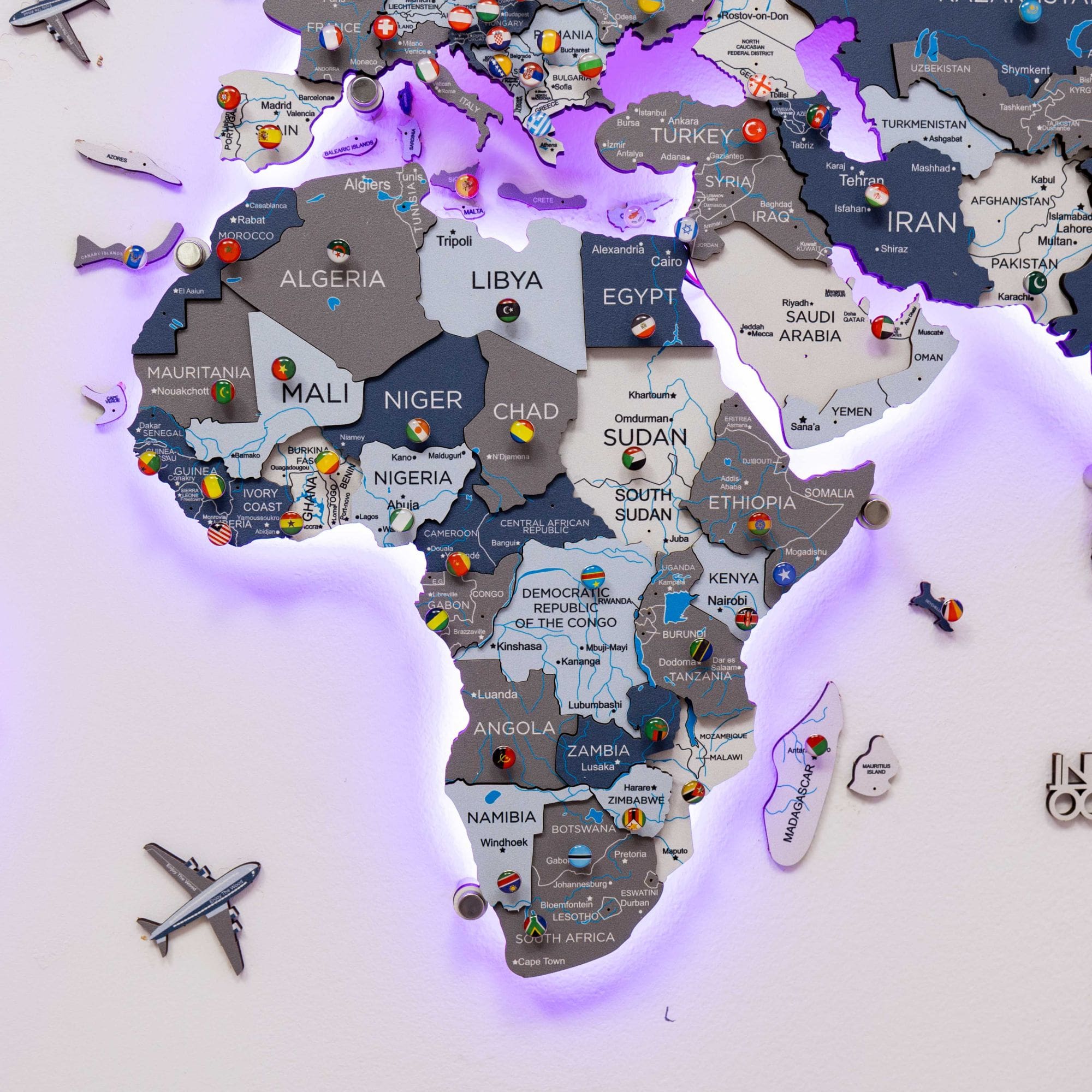Map of Africa with country names and flags, illuminated by LED lights on a white background.